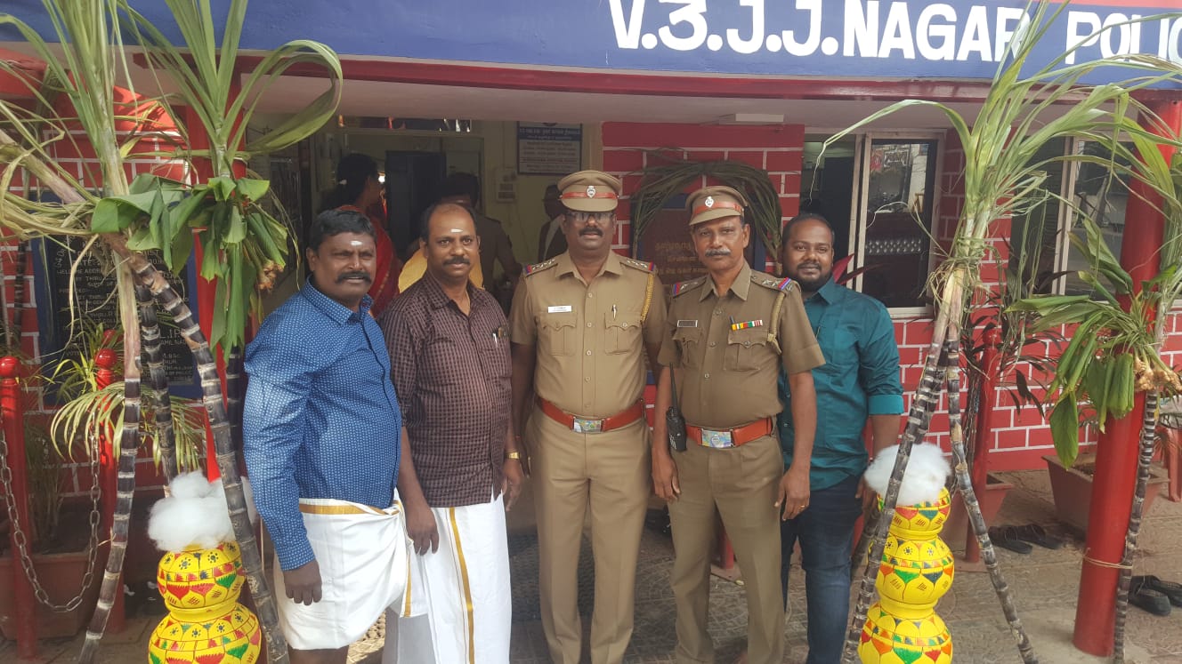 Officials discussing the features of the new AI surveillance system